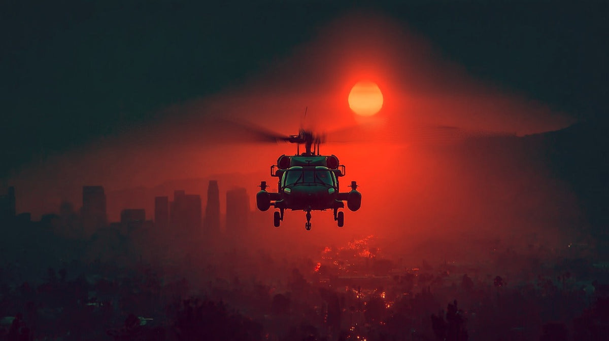 A Black Hawk helicopter centered over a hazy city at sunset